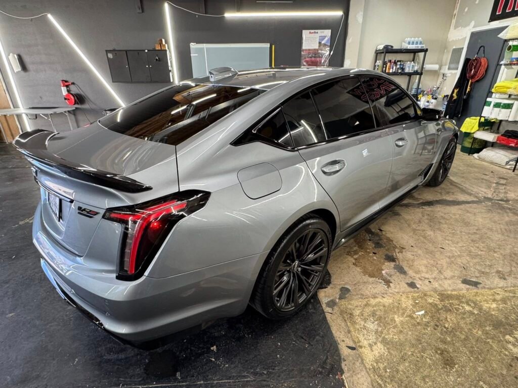 Cadillac with tinted windows by C&C Window Tint